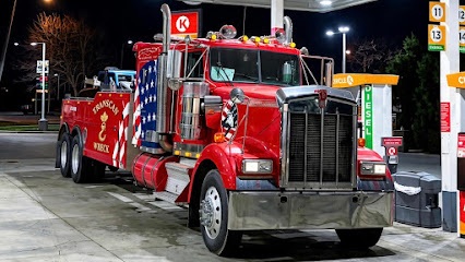 Transcan Wreck heavy-duty tow truck at night